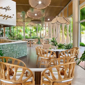 a restaurant with tables and chairs