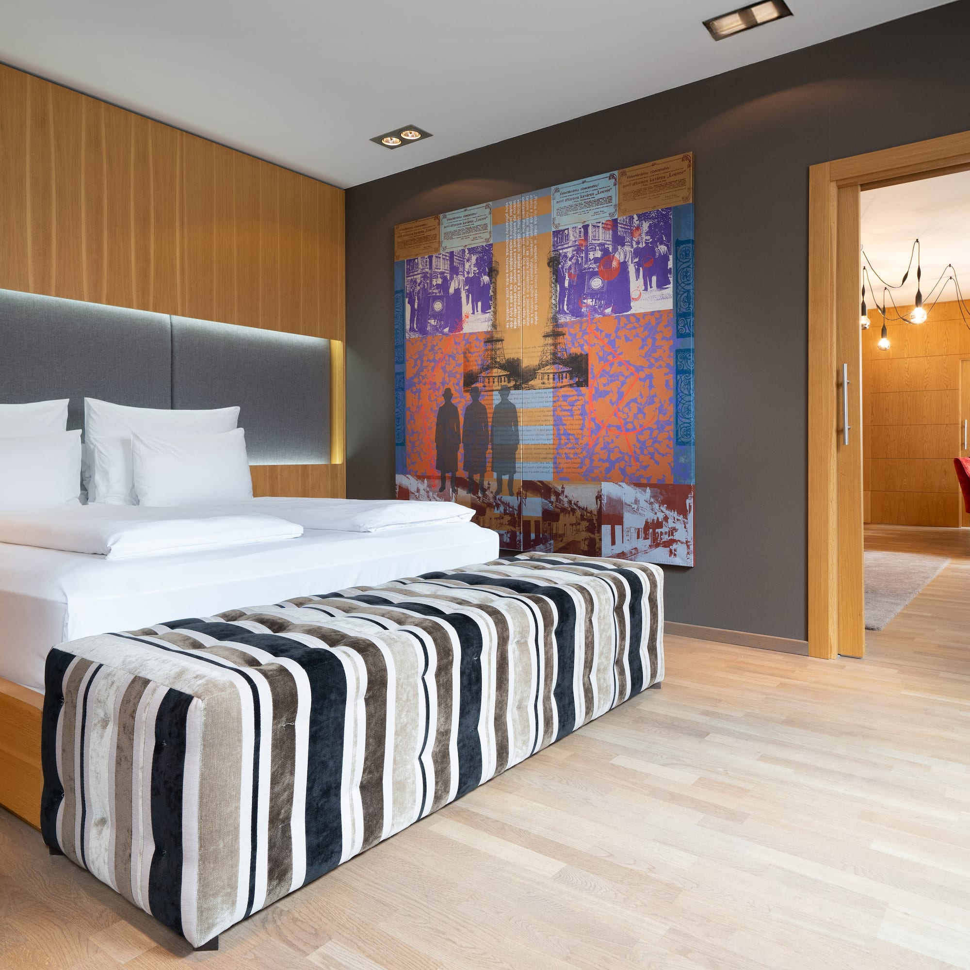 a room with a bed and a door