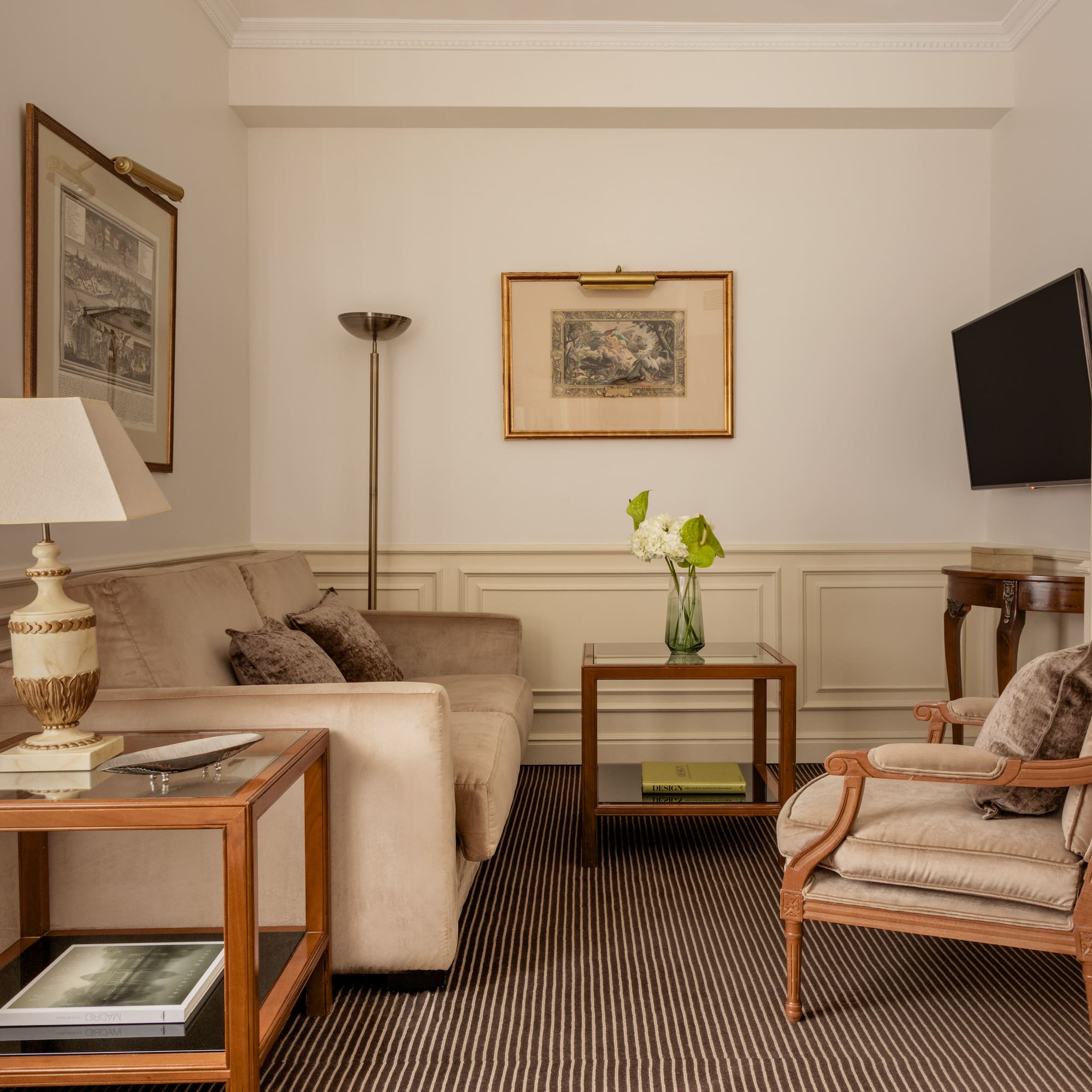 a living room with a television and couches