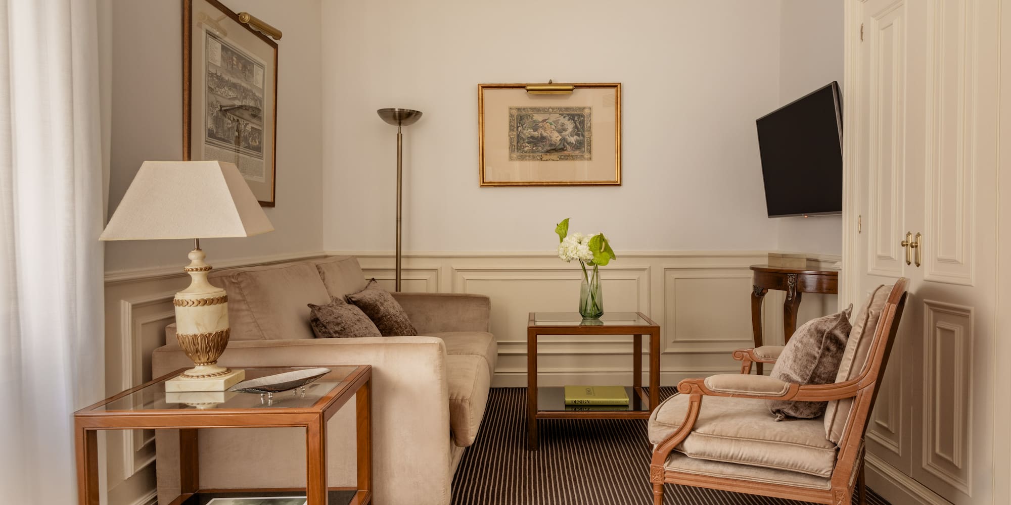 a living room with a television and couches