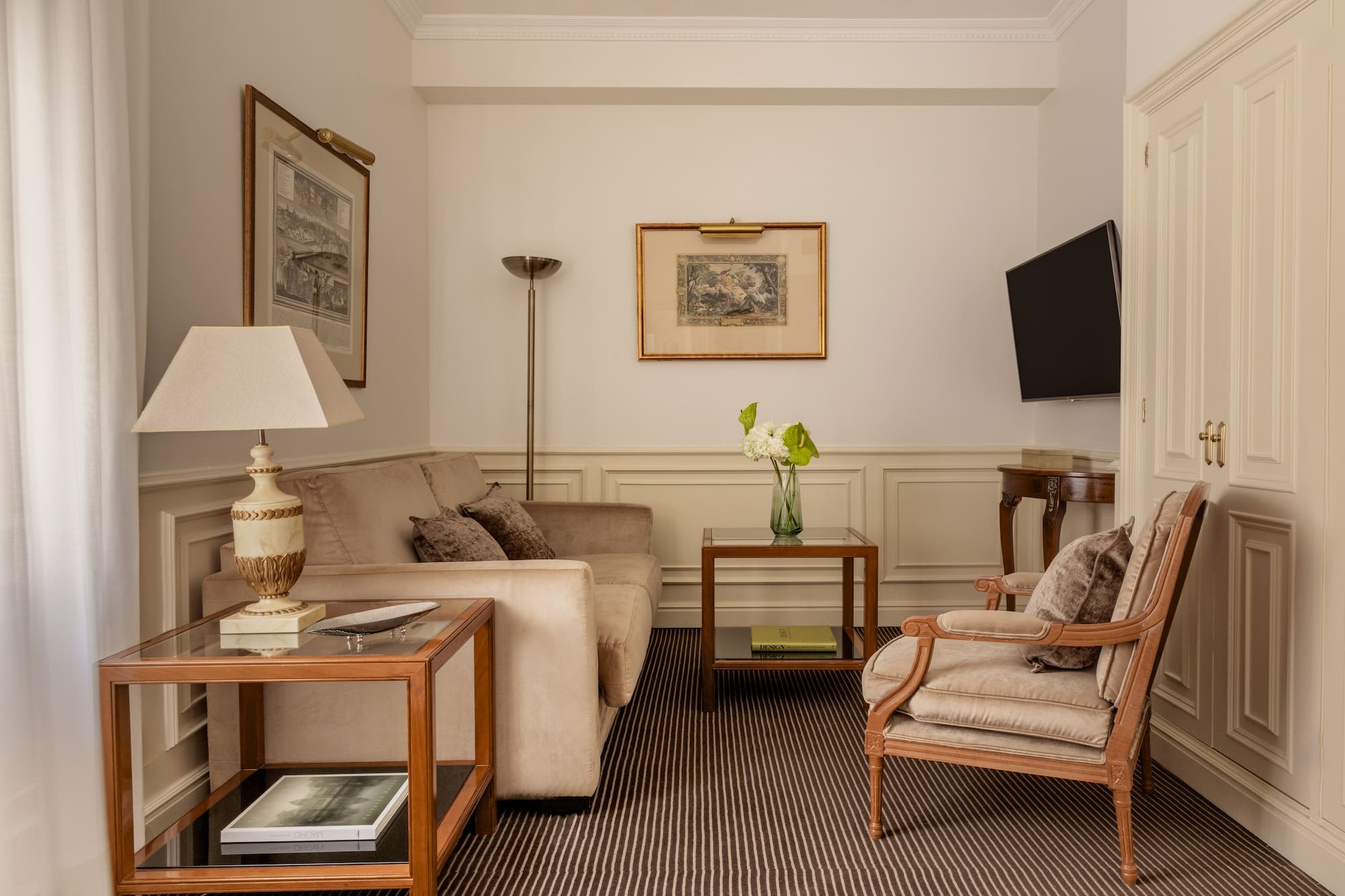 a living room with a television and couches