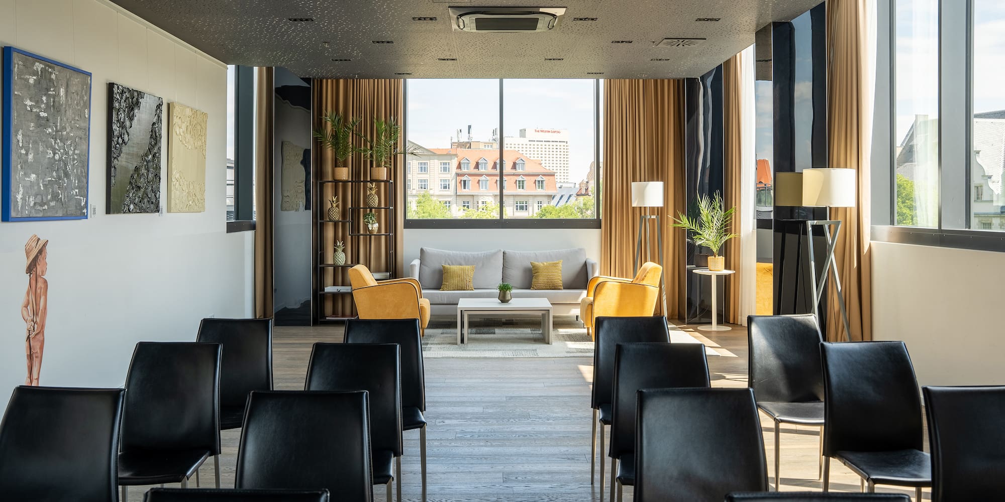 a room with chairs and a couch