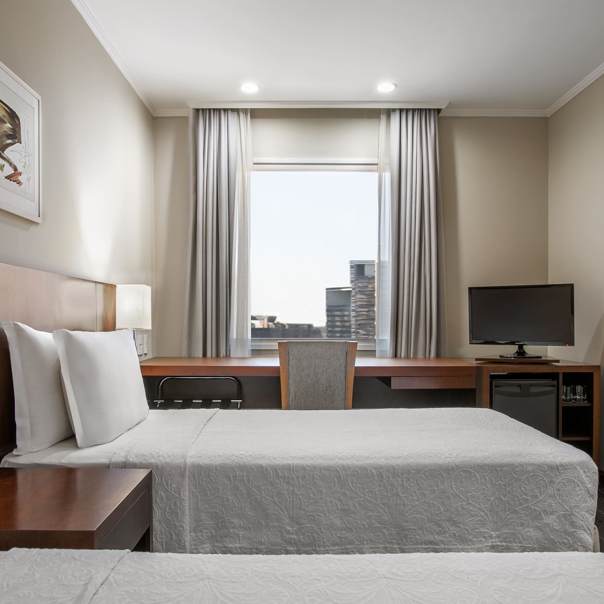 a room with a bed and a desk