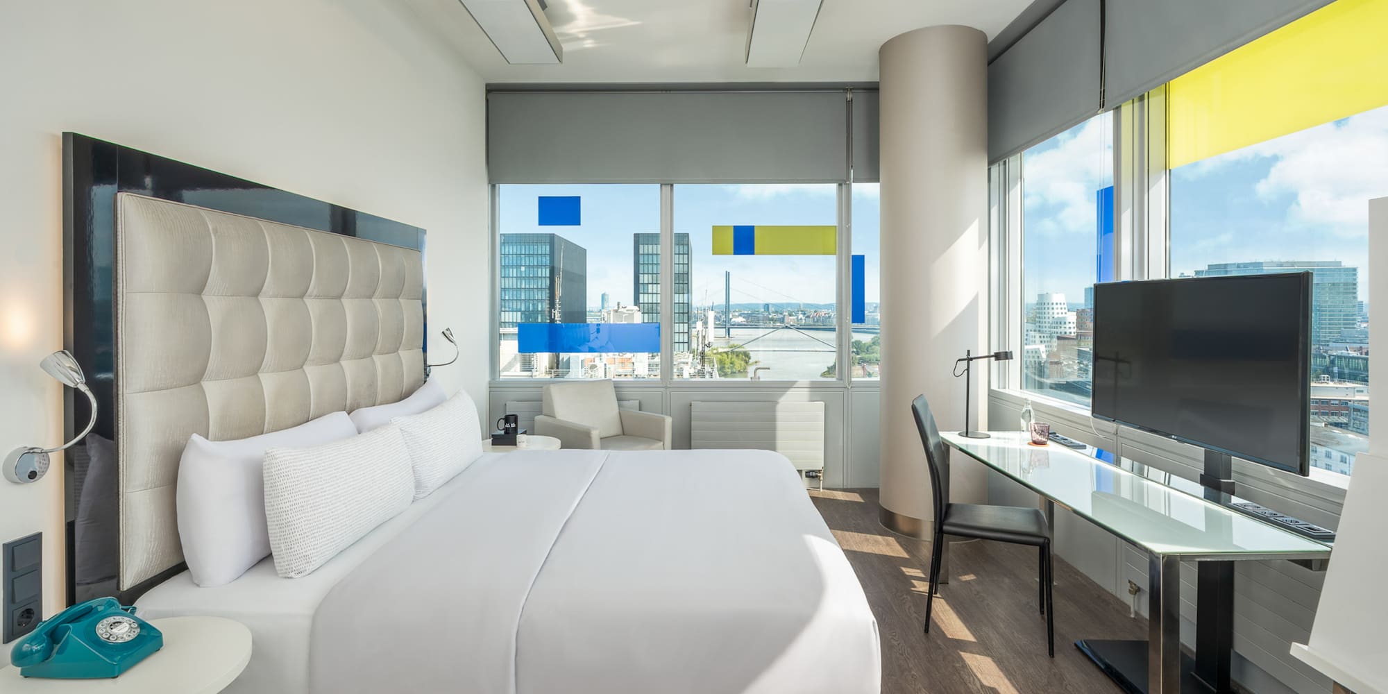 a room with a bed and a desk