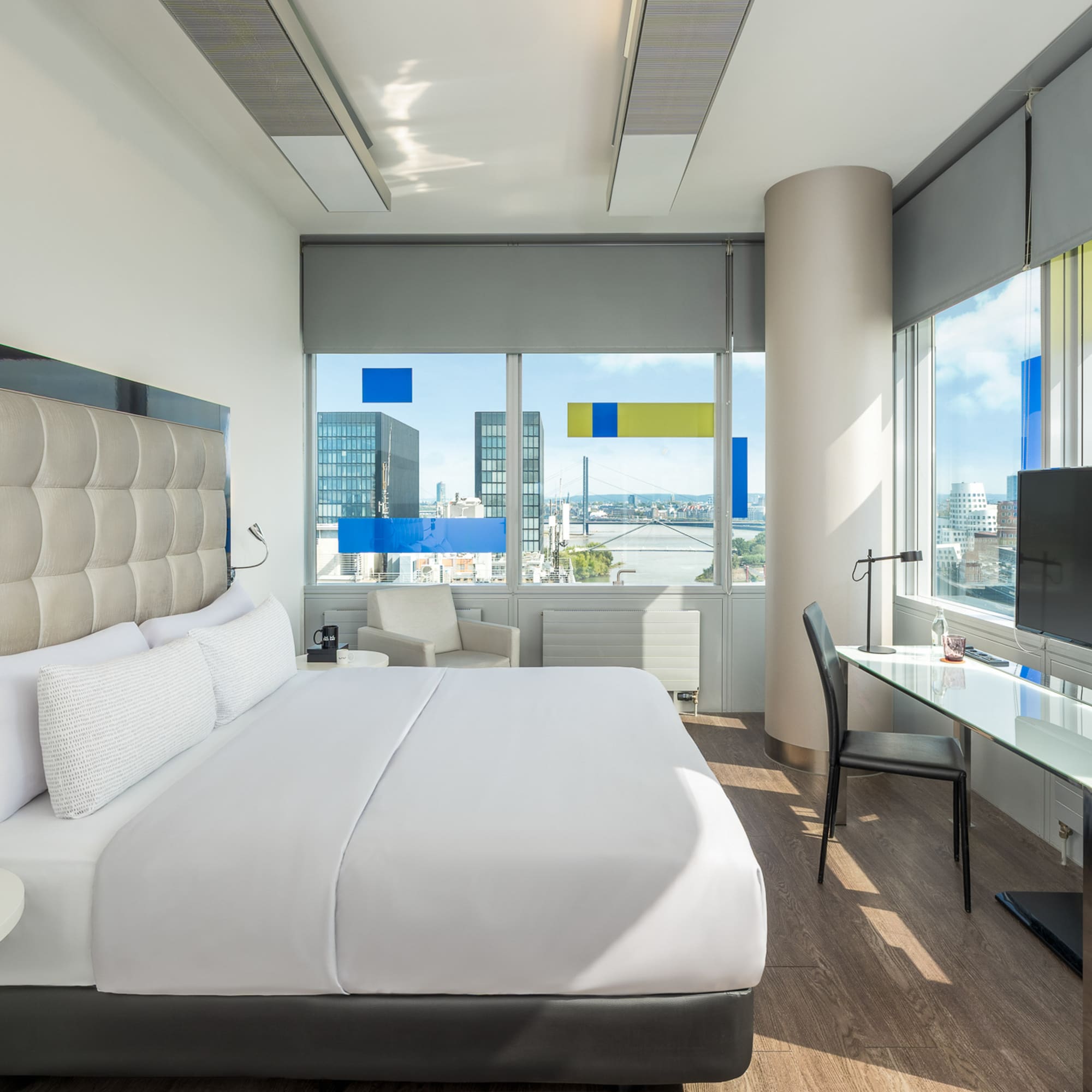 a room with a bed and a desk