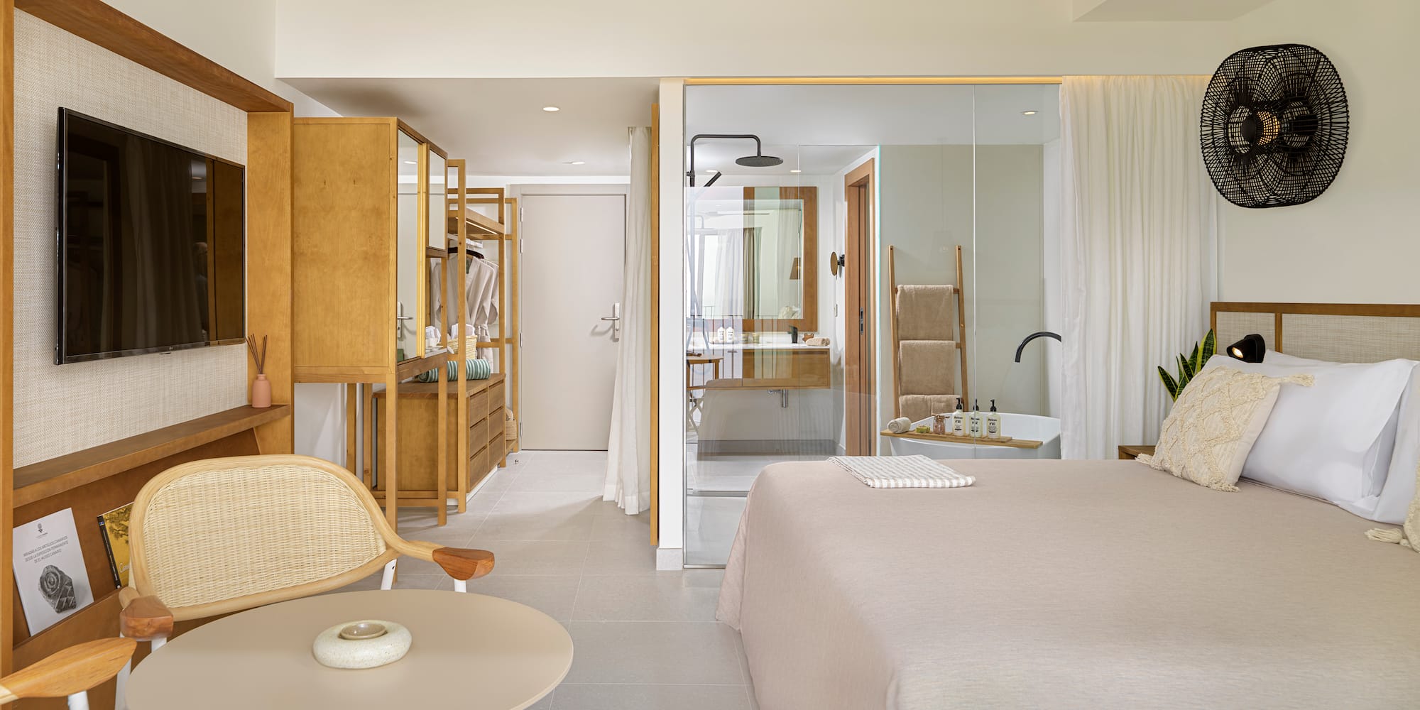 a bedroom with a bed and a table