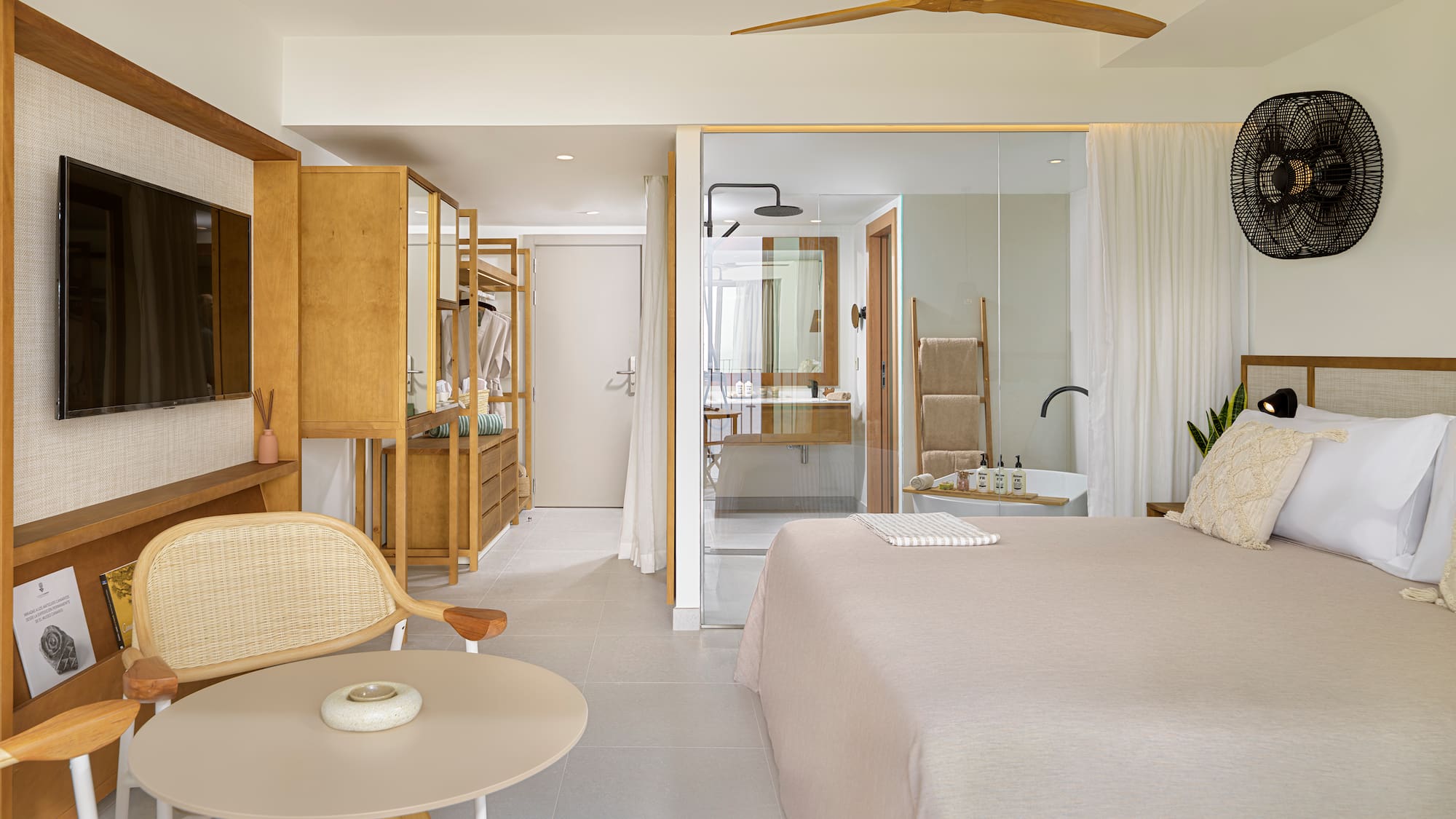 a bedroom with a bed and a table