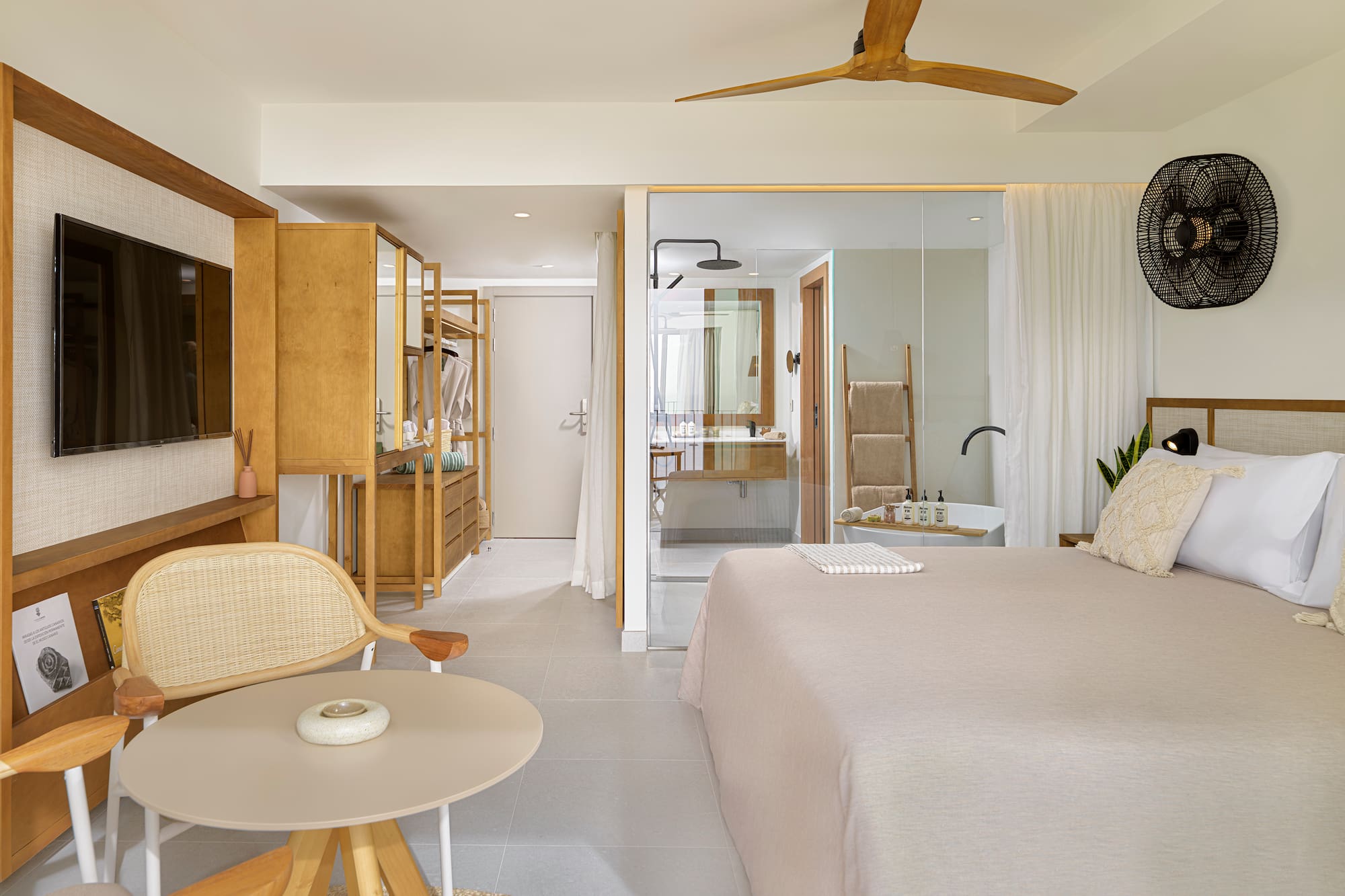 a bedroom with a bed and a table