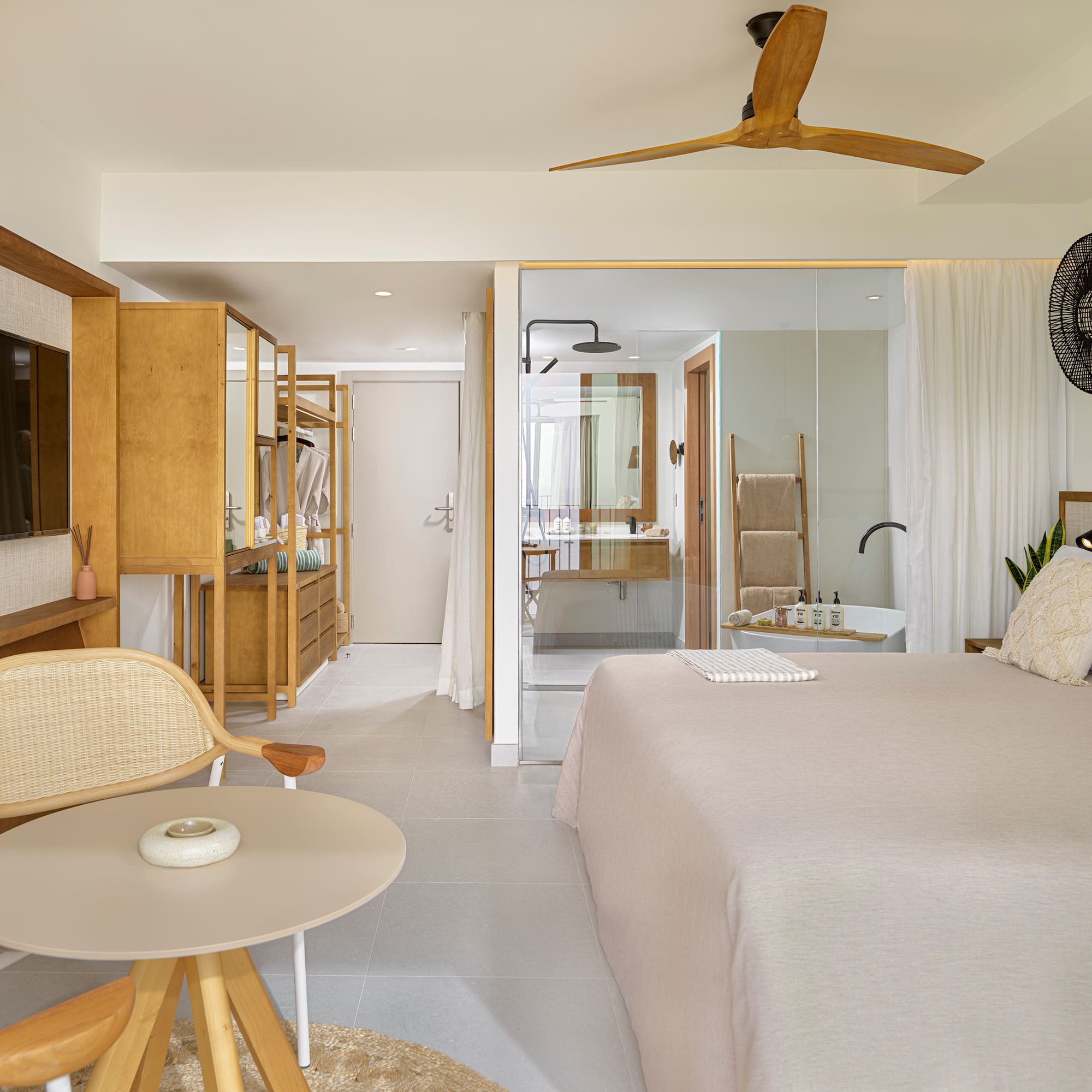 a bedroom with a bed and a table