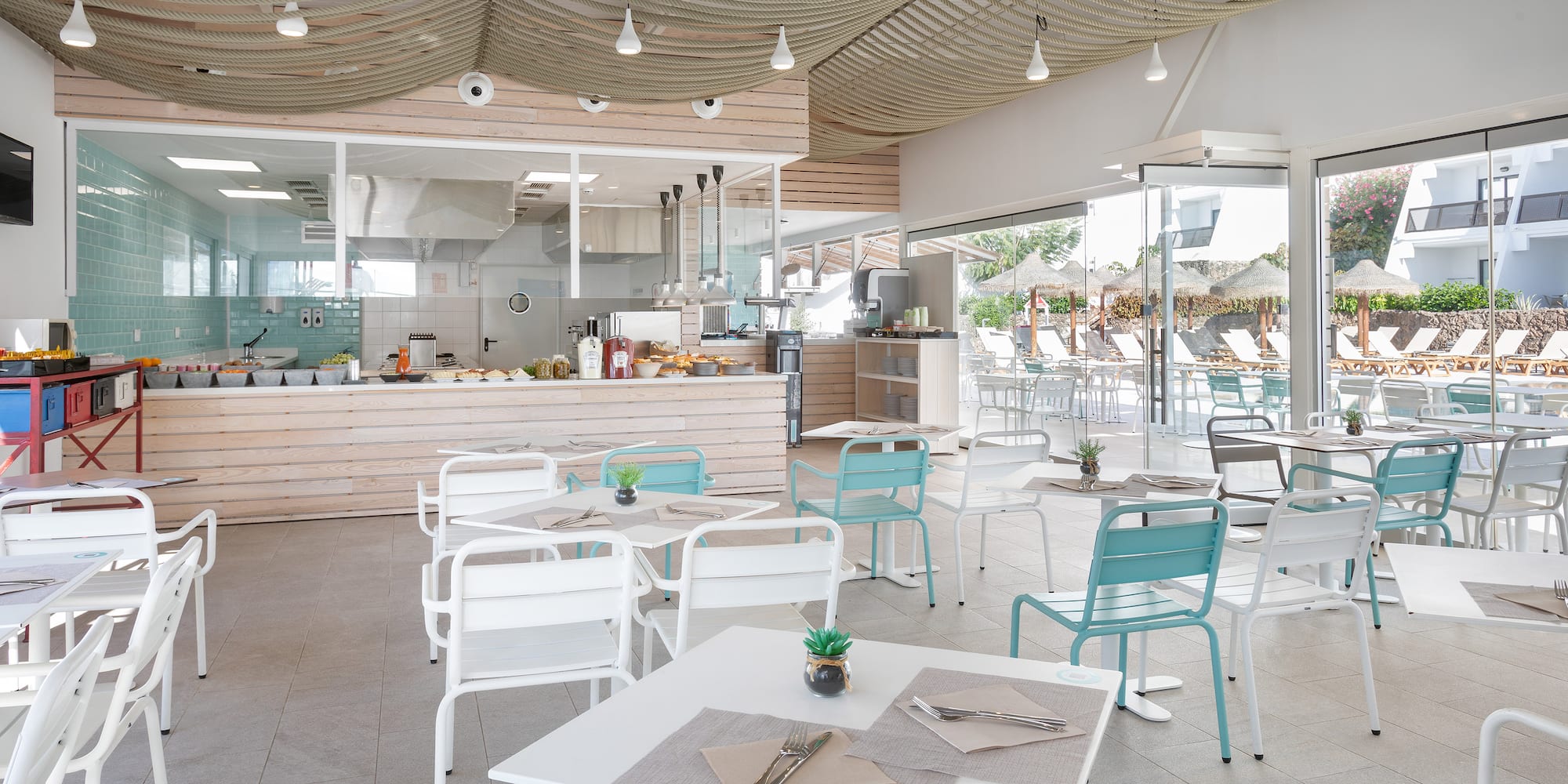 a restaurant with tables and chairs