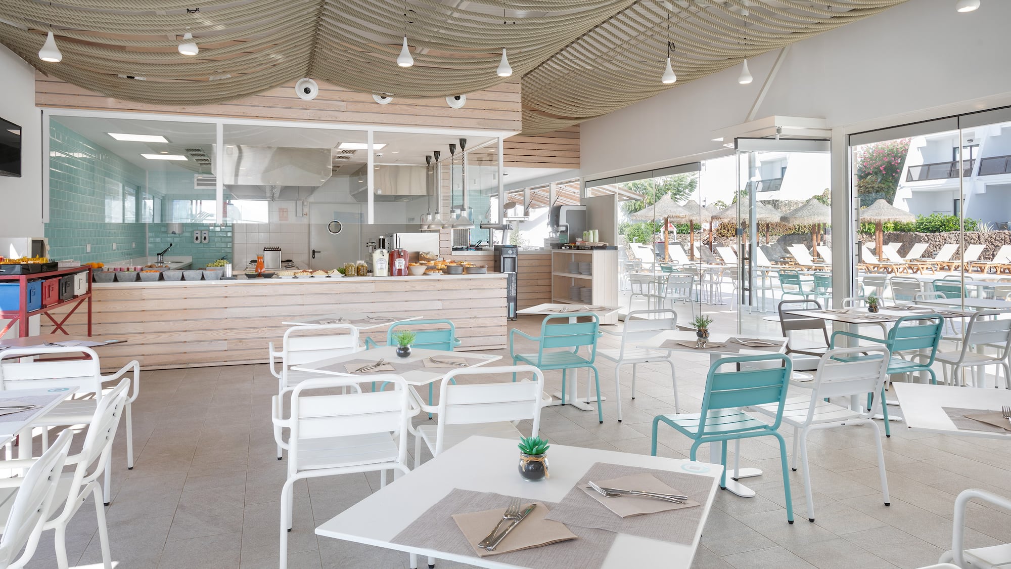 a restaurant with tables and chairs