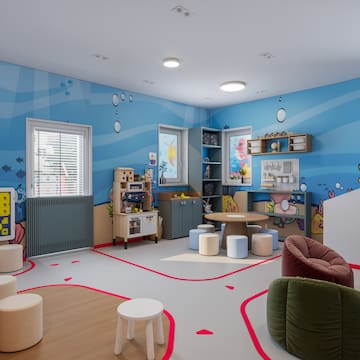 a room with a blue wall and a blue floor with a blue wall and a blue floor with a blue wall and a blue floor with a blue wall and a blue floor with a blue wall and