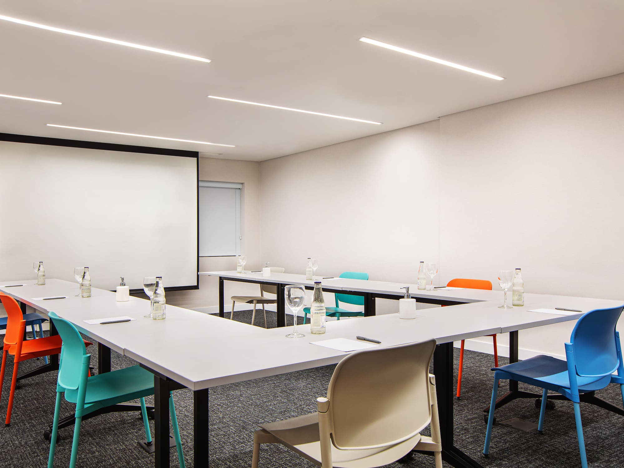 a room with tables and chairs