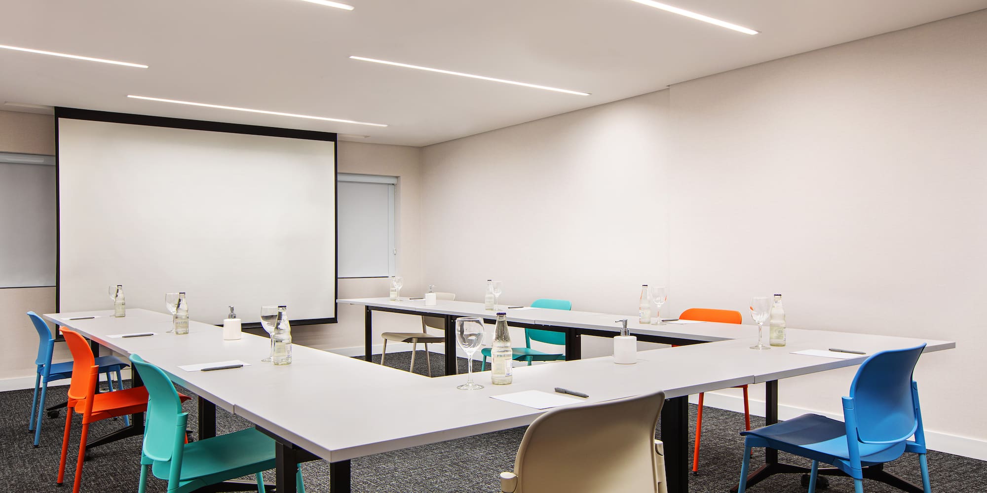 a room with tables and chairs