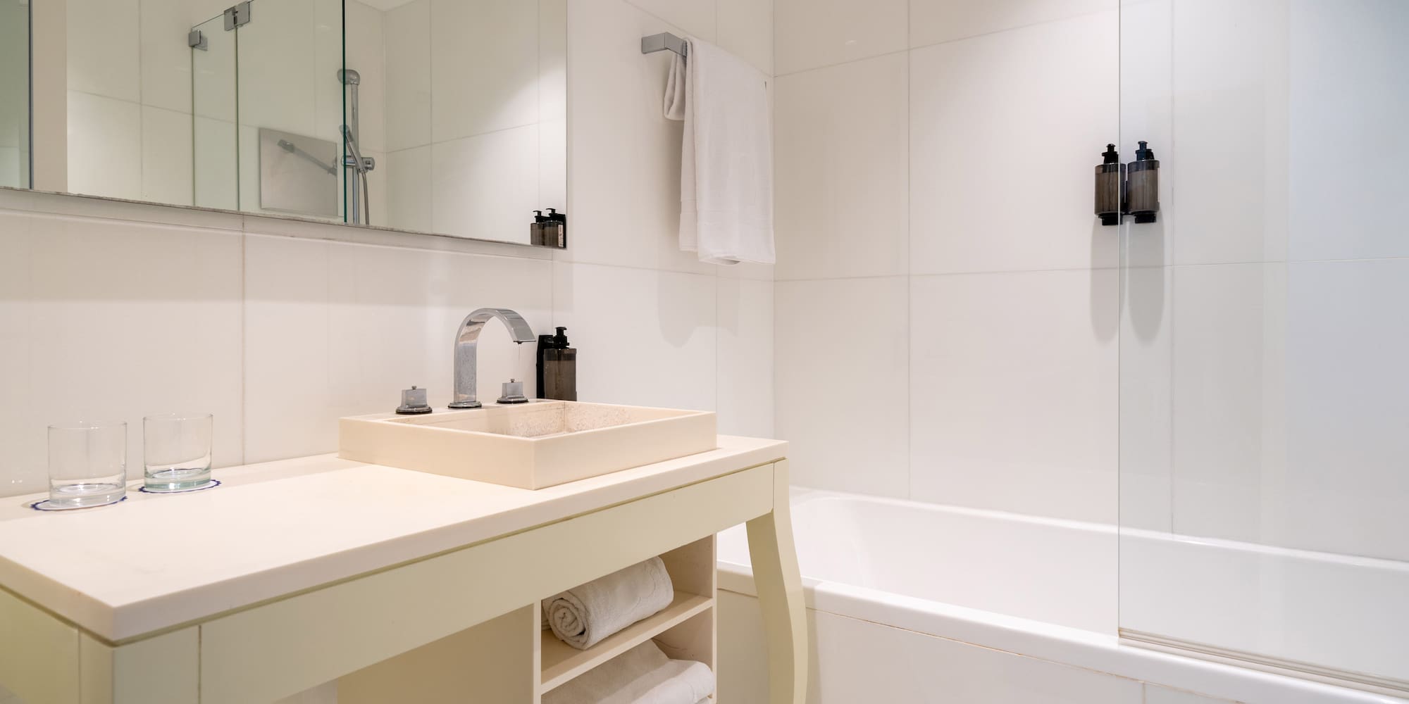 a bathroom with a sink and bathtub