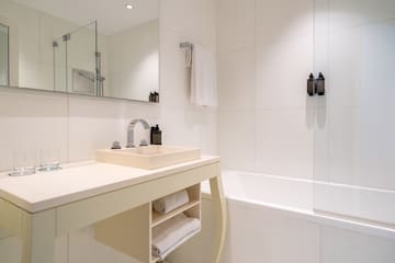 a bathroom with a sink and bathtub