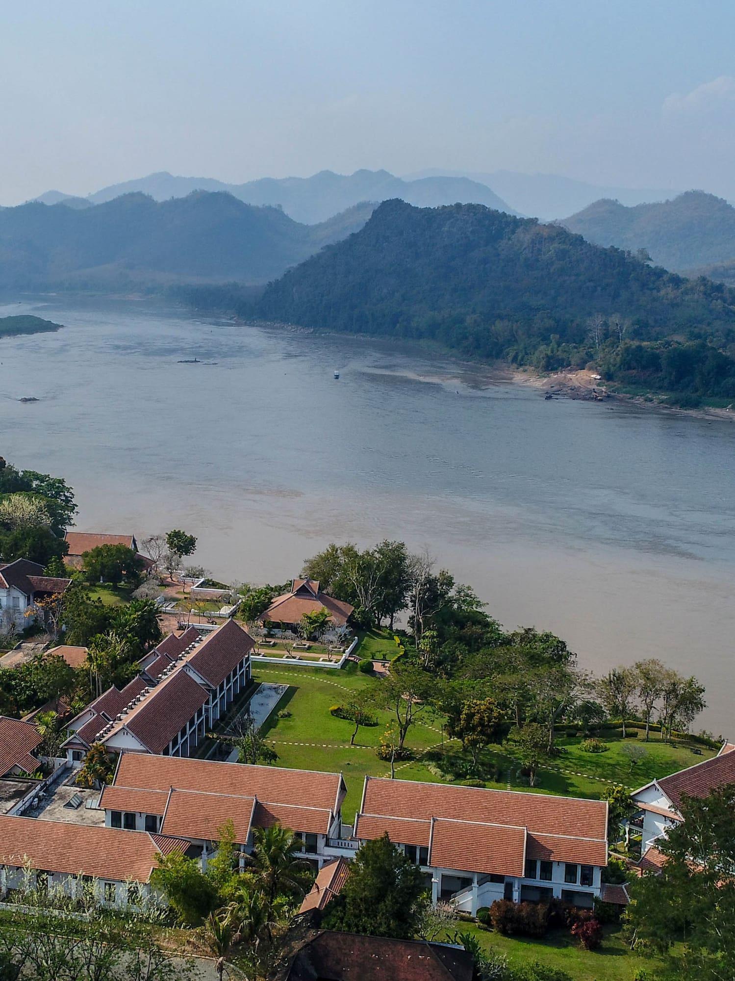 a group of houses next to a river