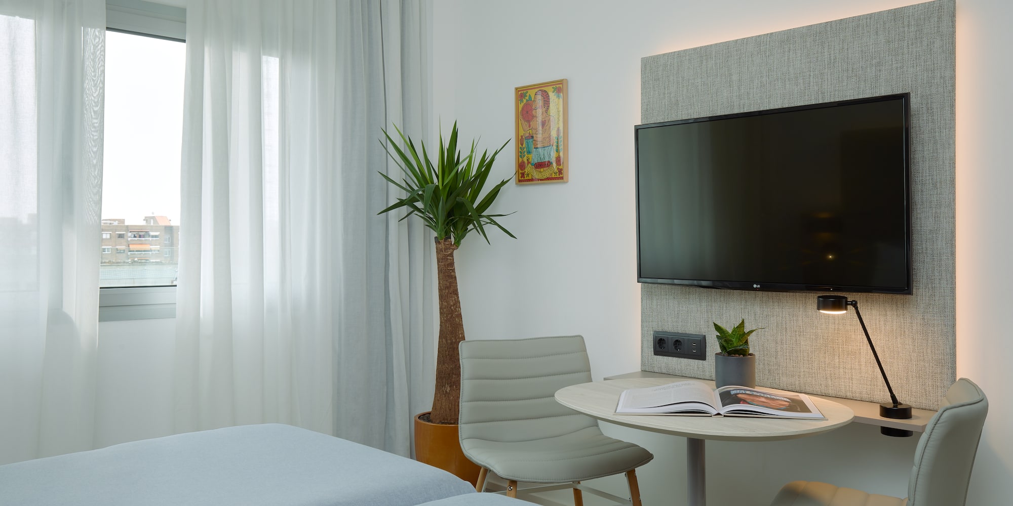 a room with a tv and a table