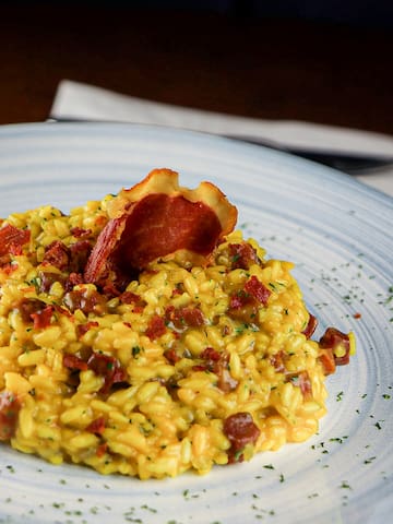 a plate of food with bacon