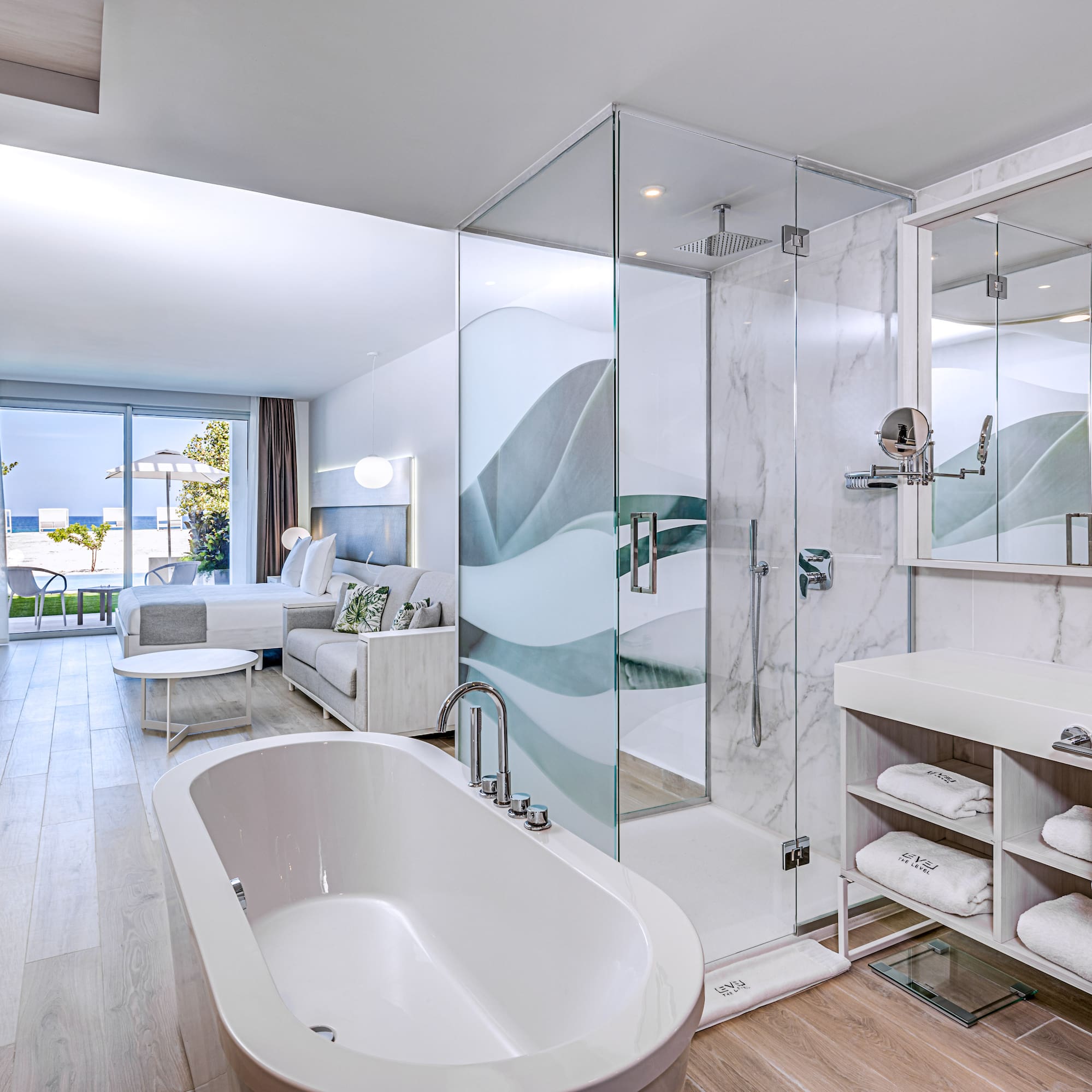 a bathroom with a tub and shower