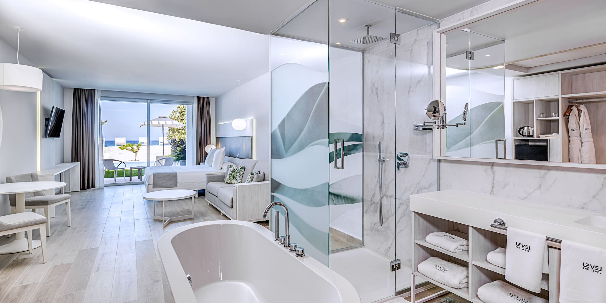 a bathroom with a tub and shower