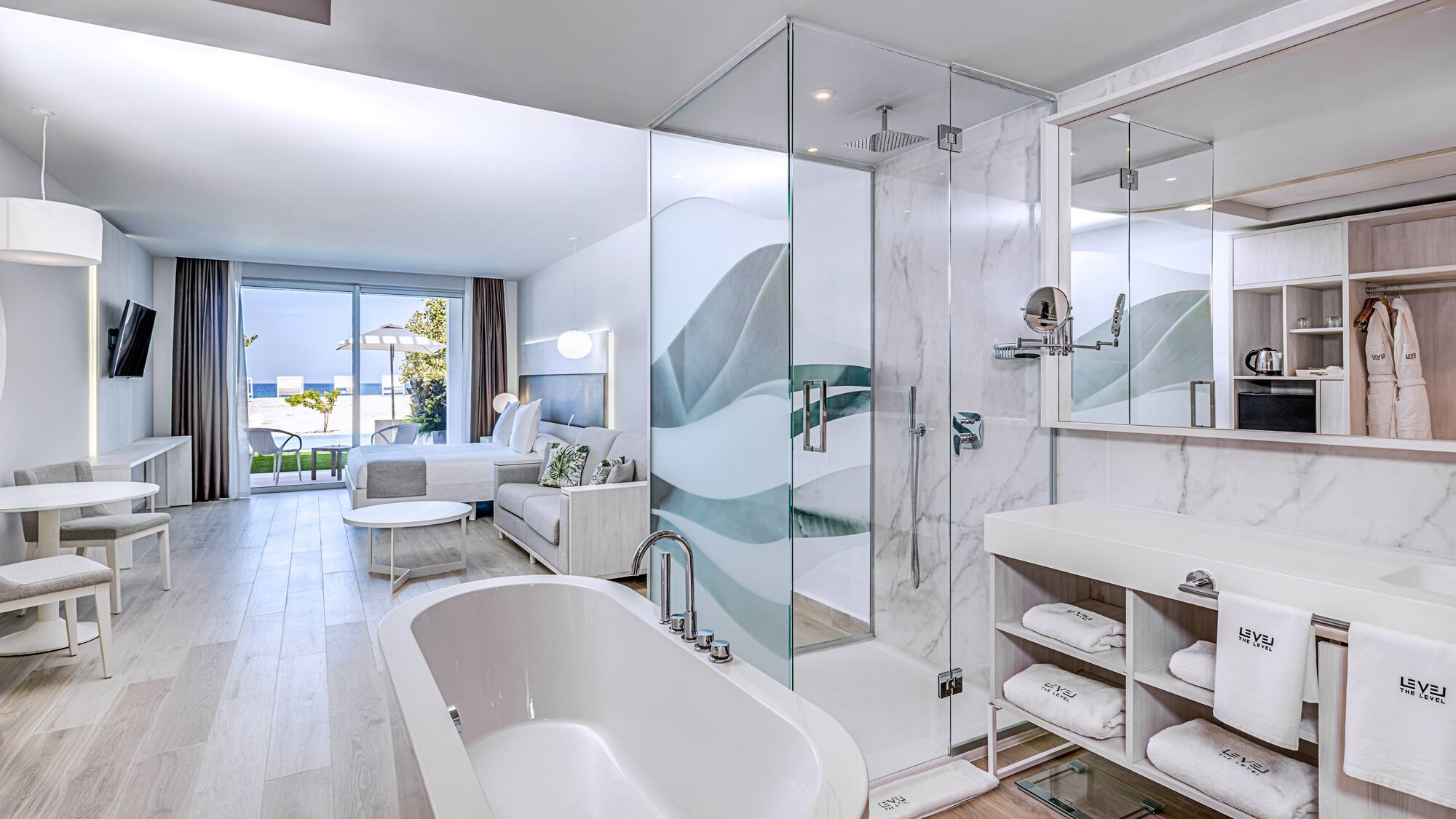 a bathroom with a tub and shower