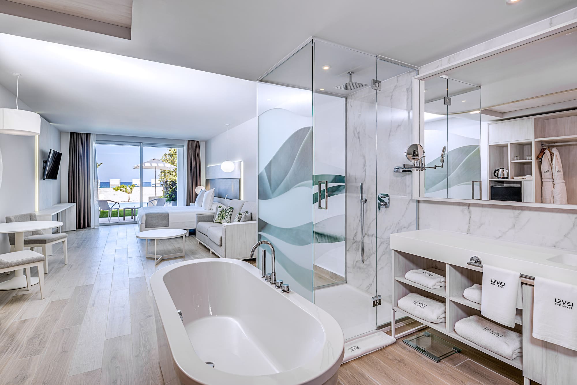 a bathroom with a tub and shower