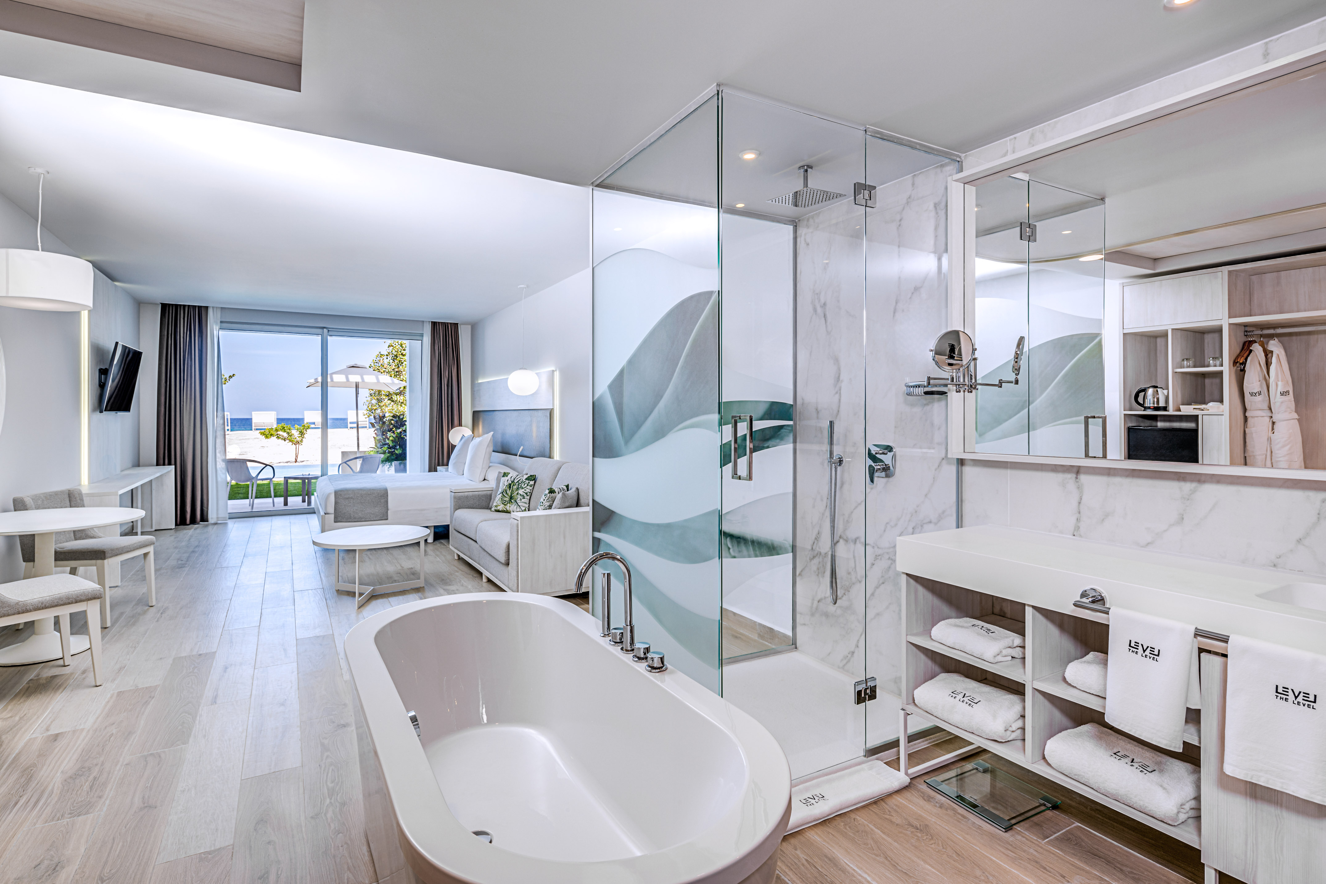 a bathroom with a tub and shower