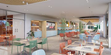 a restaurant with tables and chairs