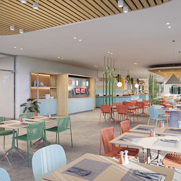 a restaurant with tables and chairs