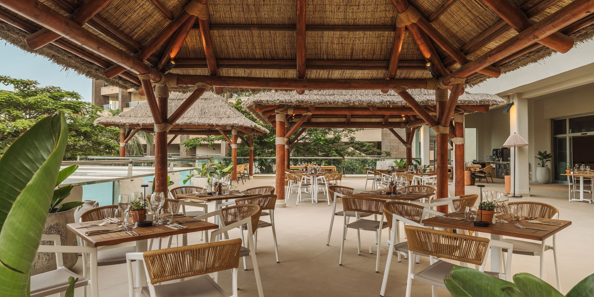 a restaurant with tables and chairs