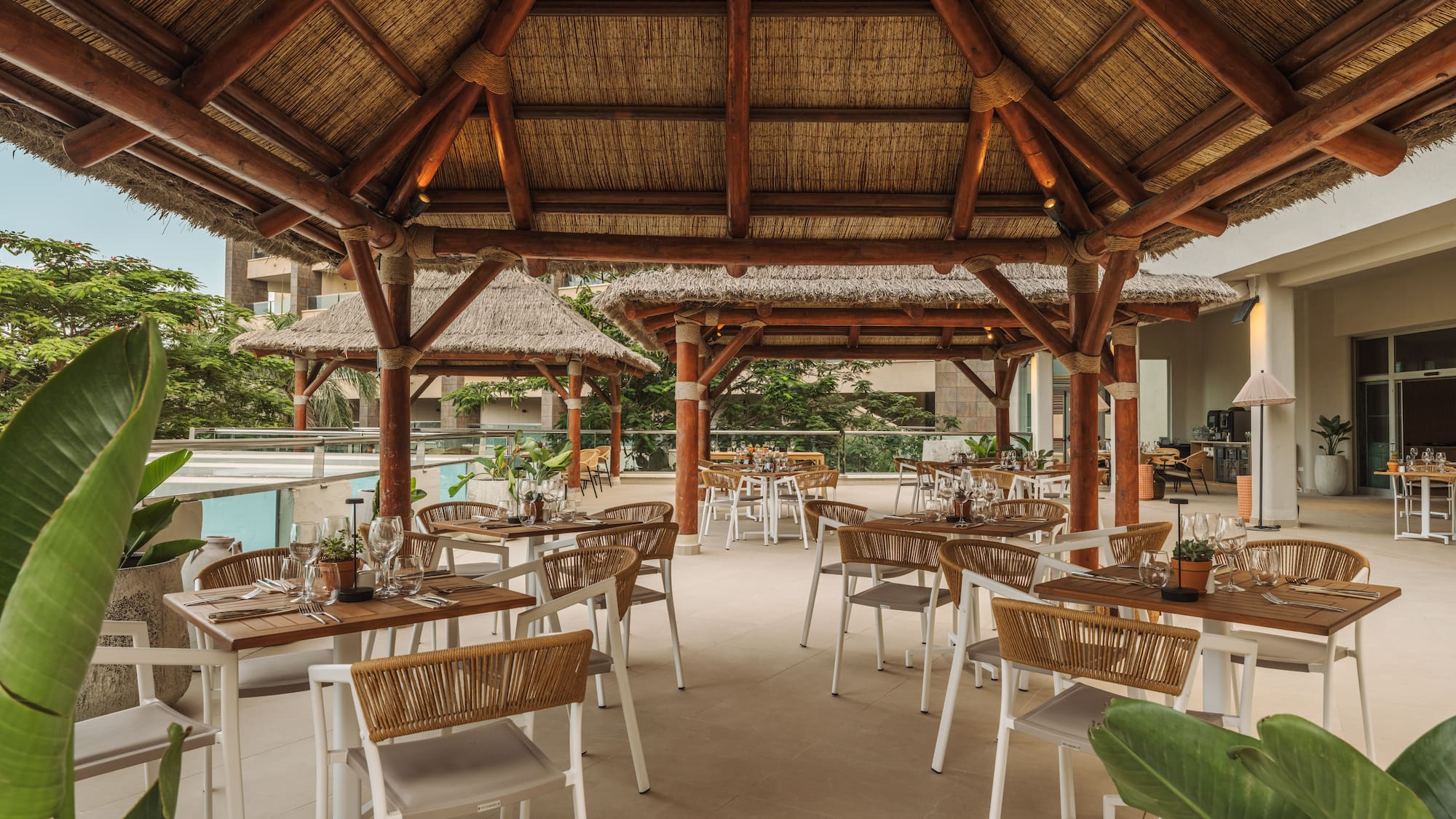 a restaurant with tables and chairs