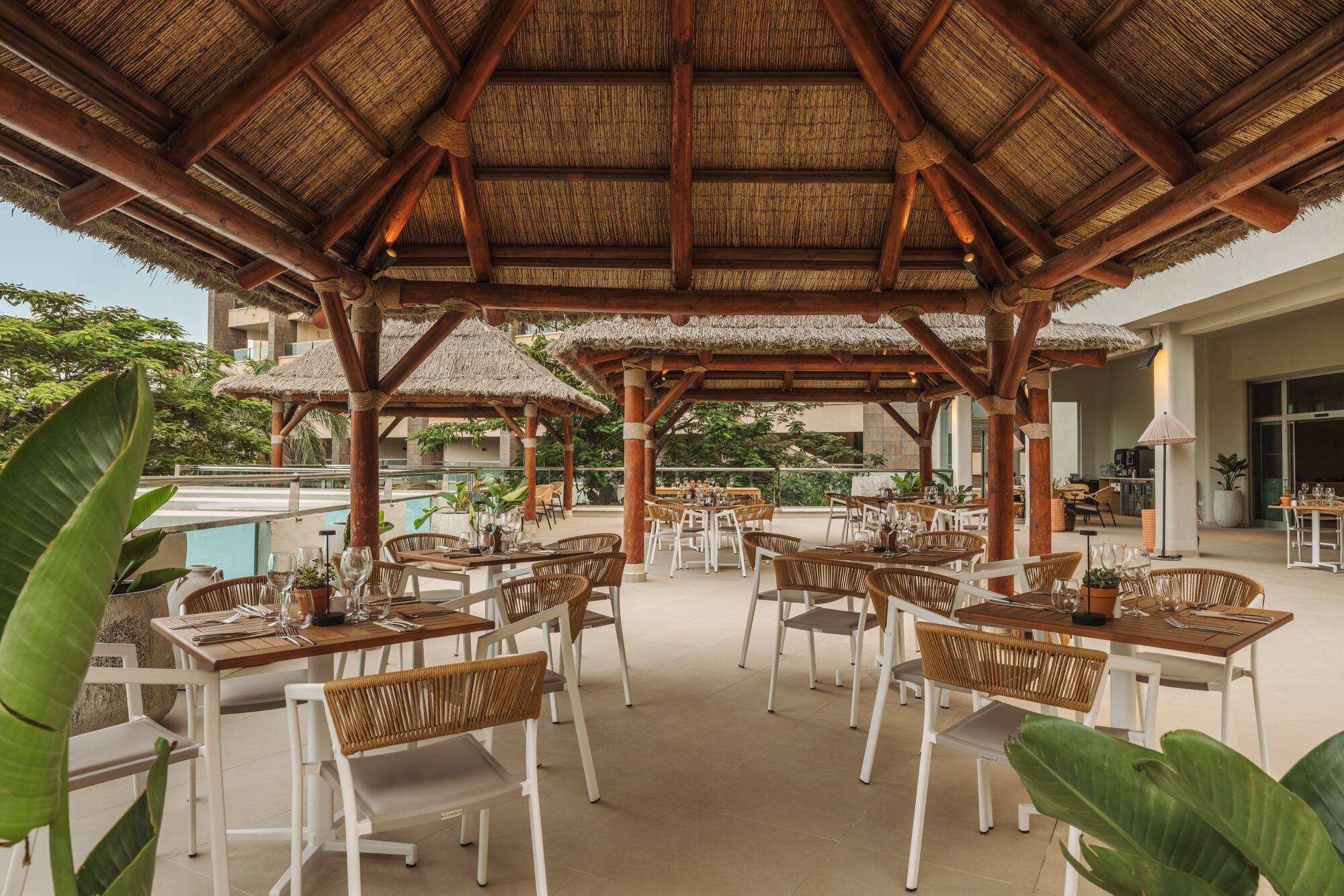 a restaurant with tables and chairs
