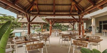 a restaurant with tables and chairs