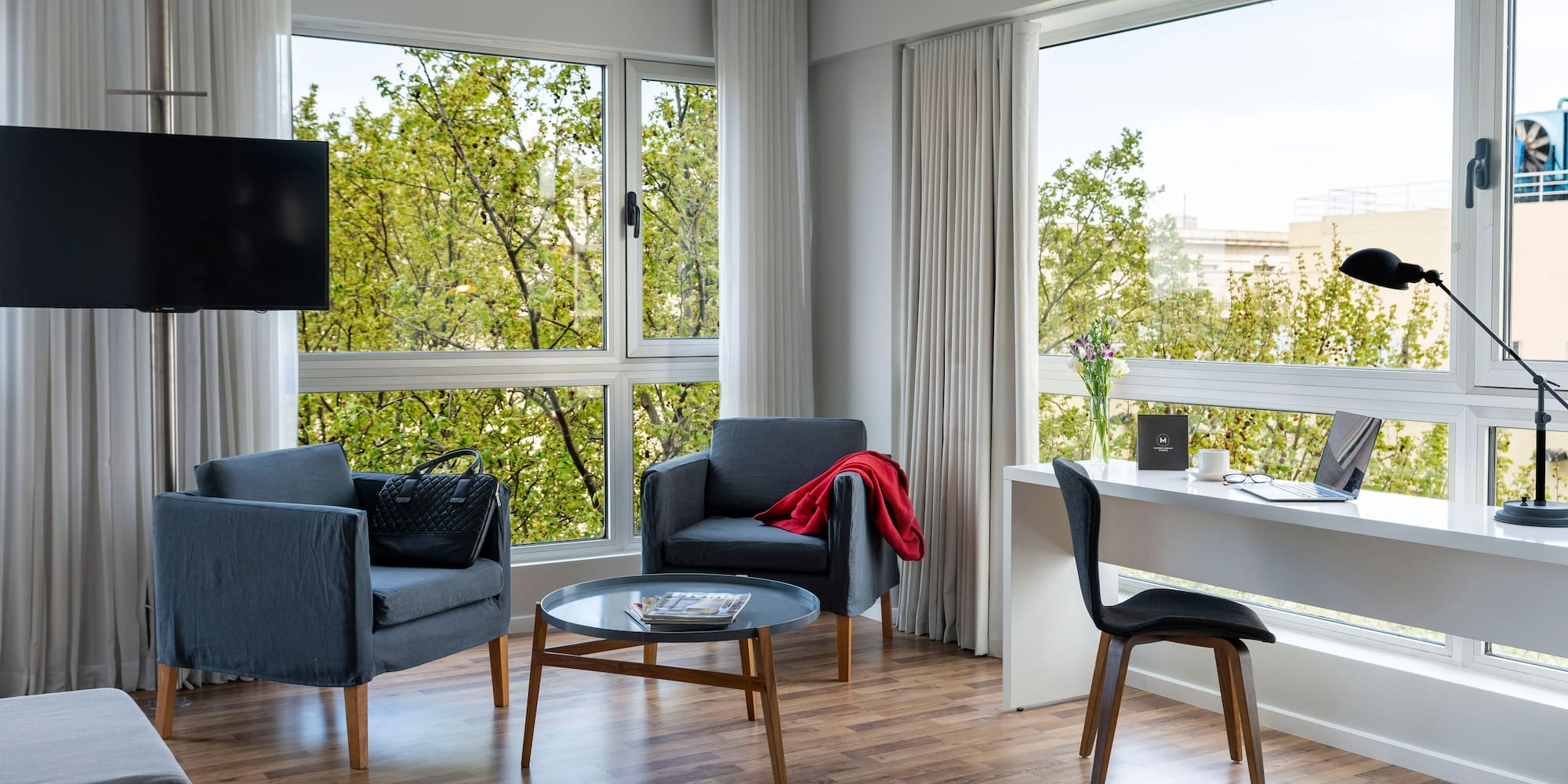 a room with a table and chairs