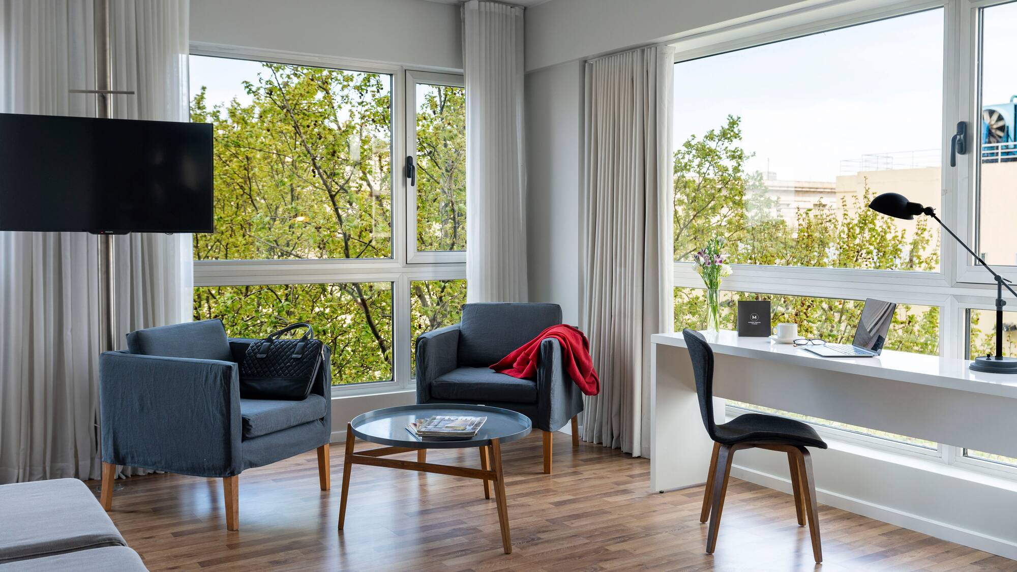 a room with a table and chairs