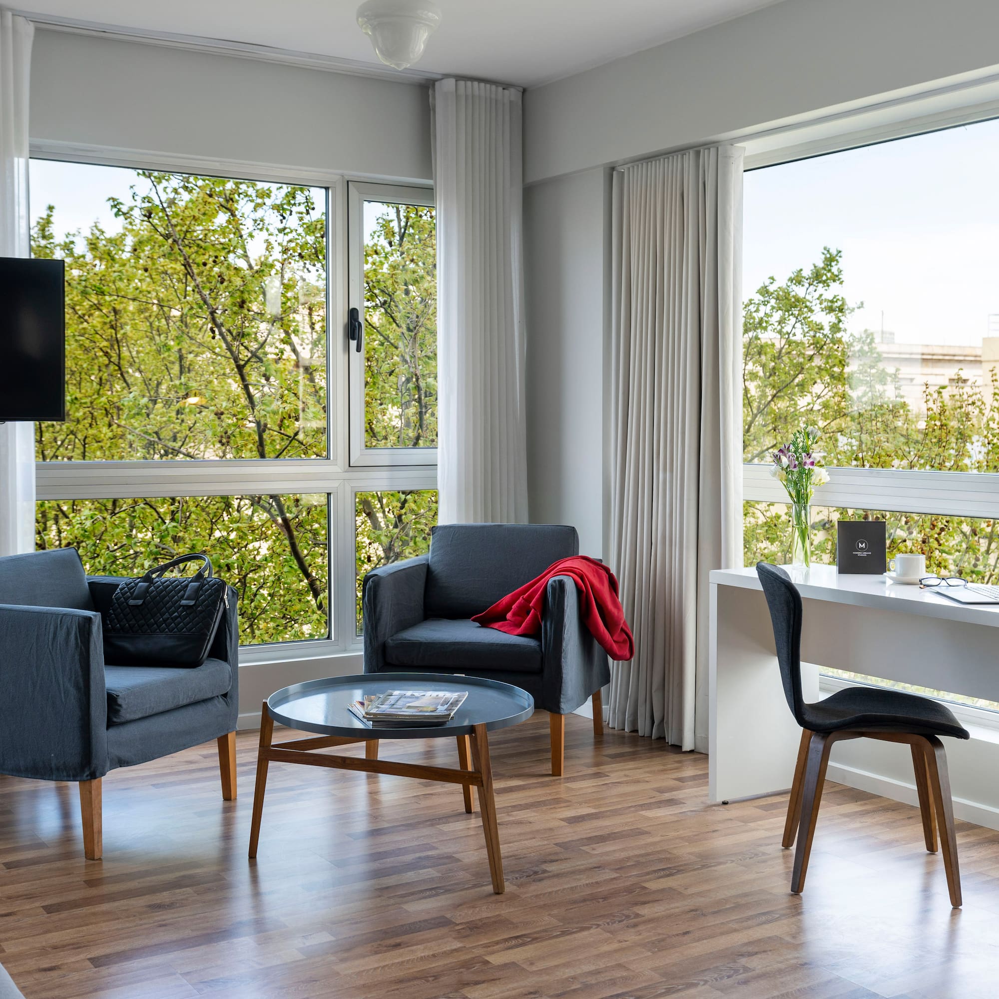 a room with a table and chairs