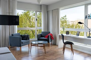 a room with a table and chairs