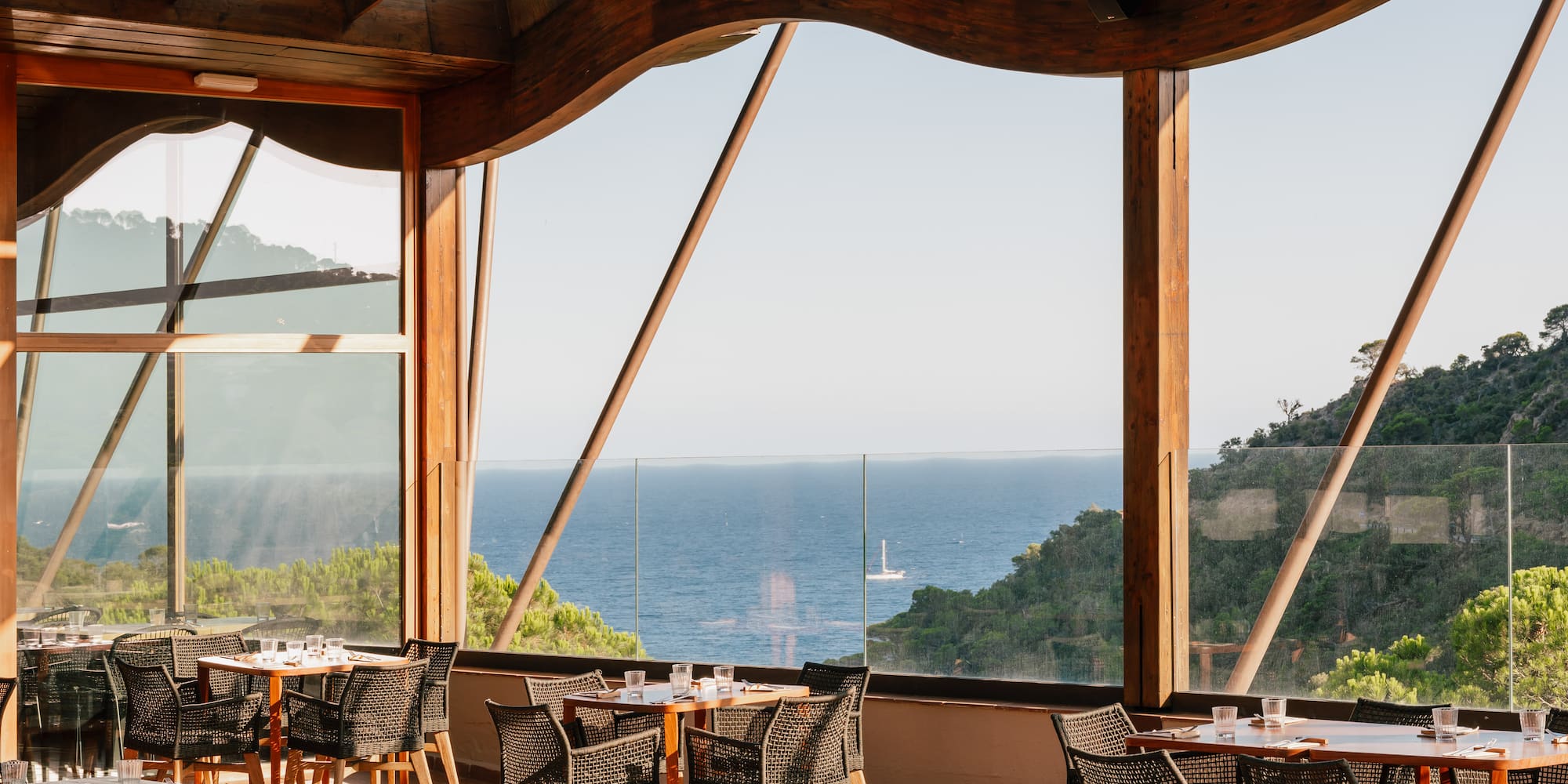 a restaurant with tables and chairs