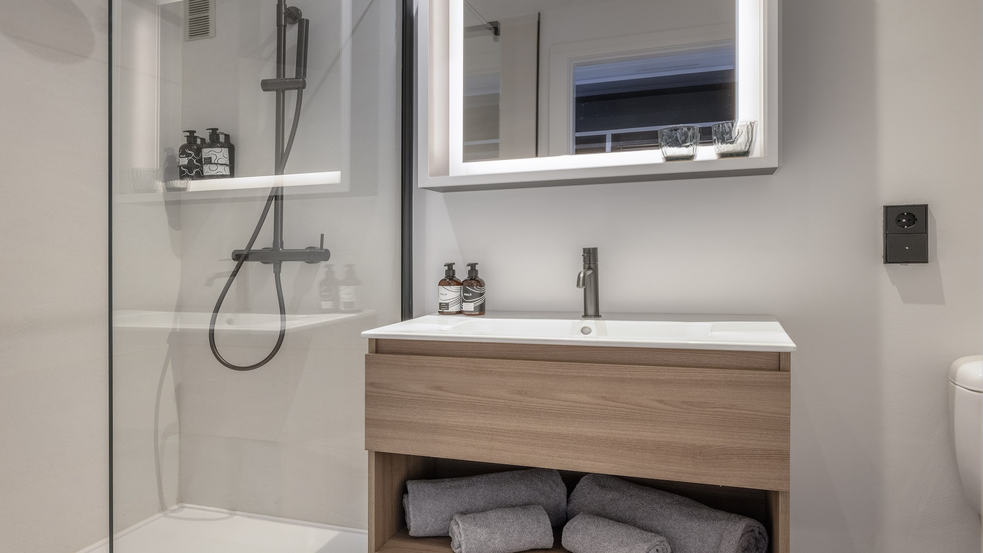 a bathroom with a mirror and a sink