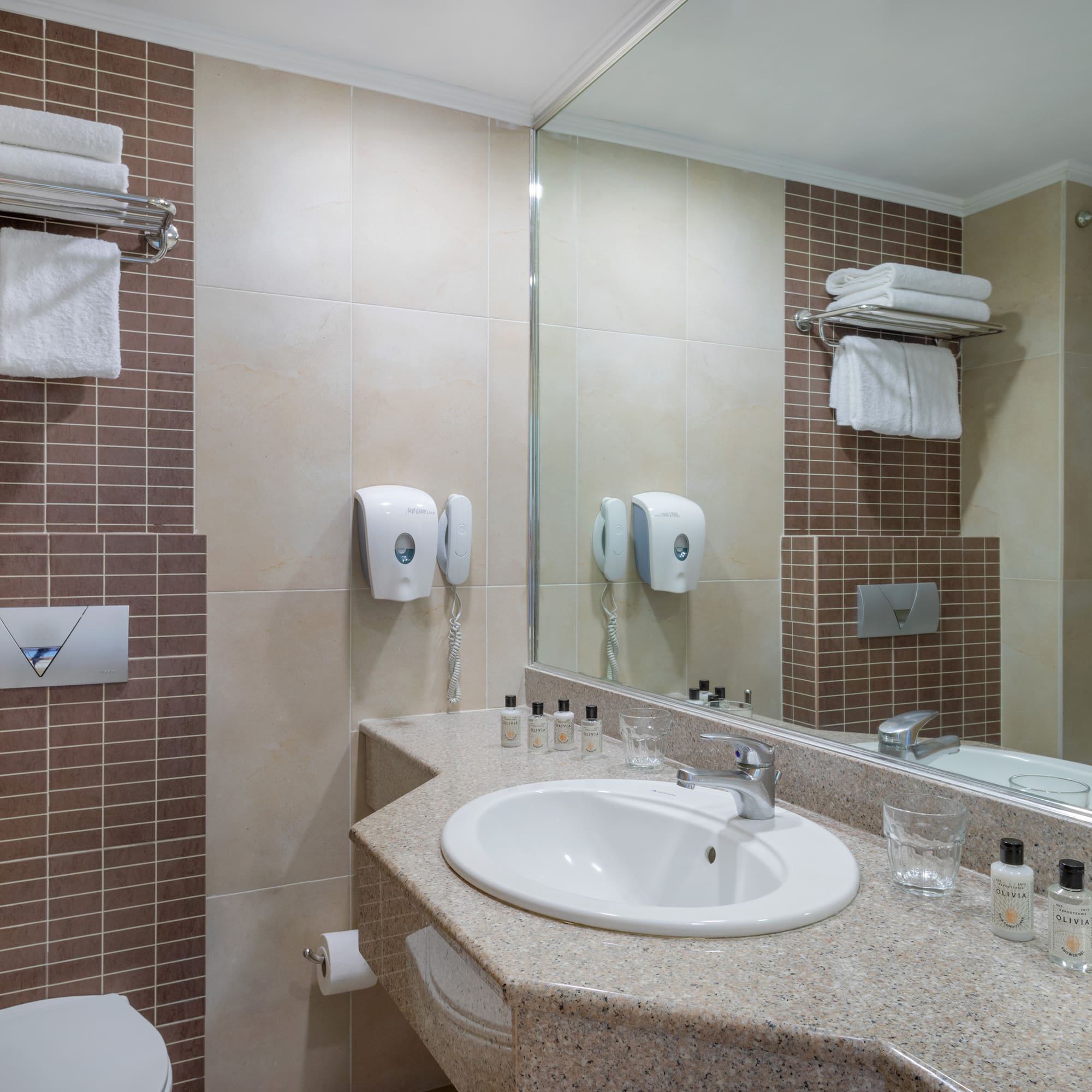 a bathroom with a sink and mirror