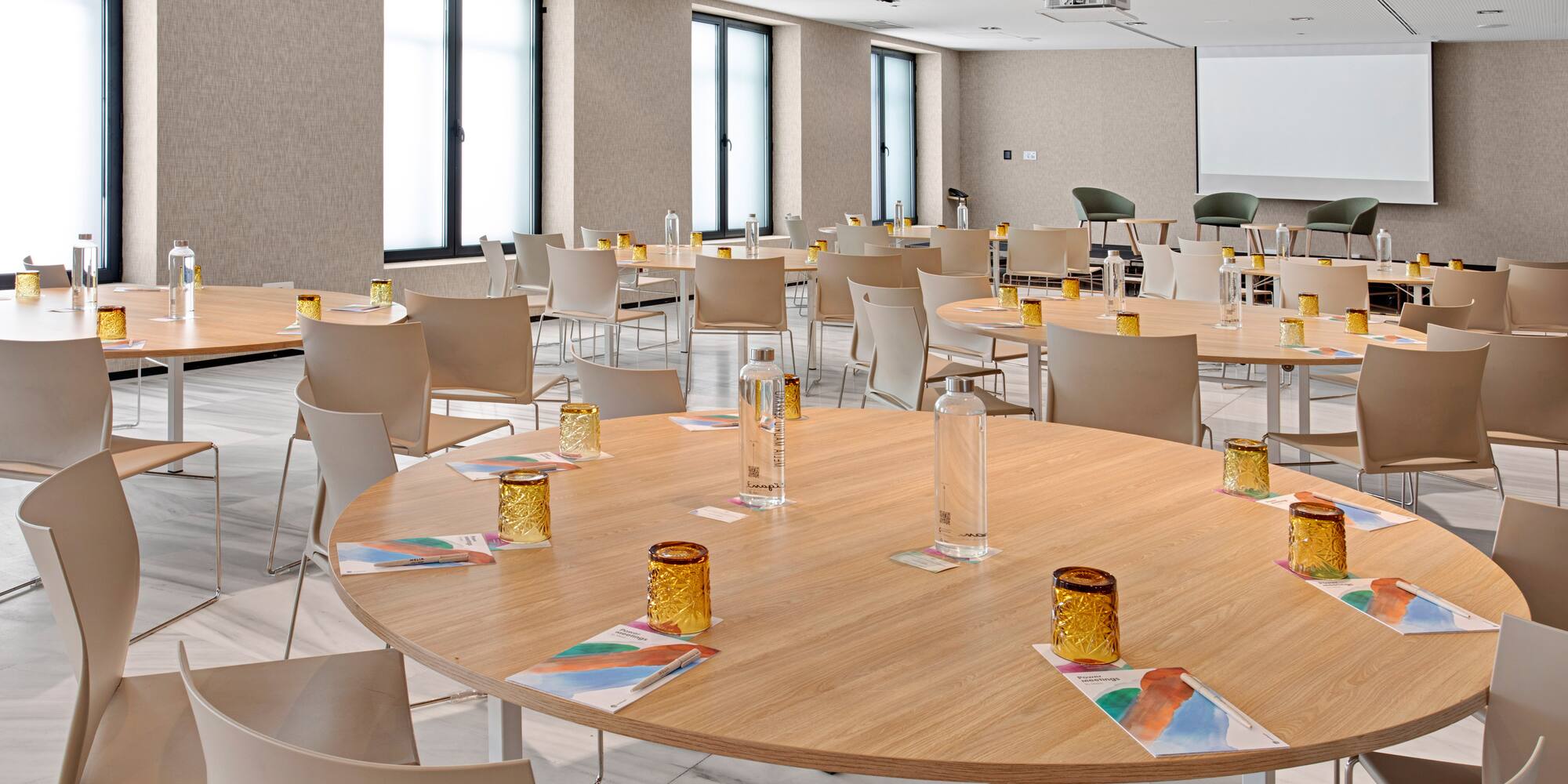 a room with tables and chairs