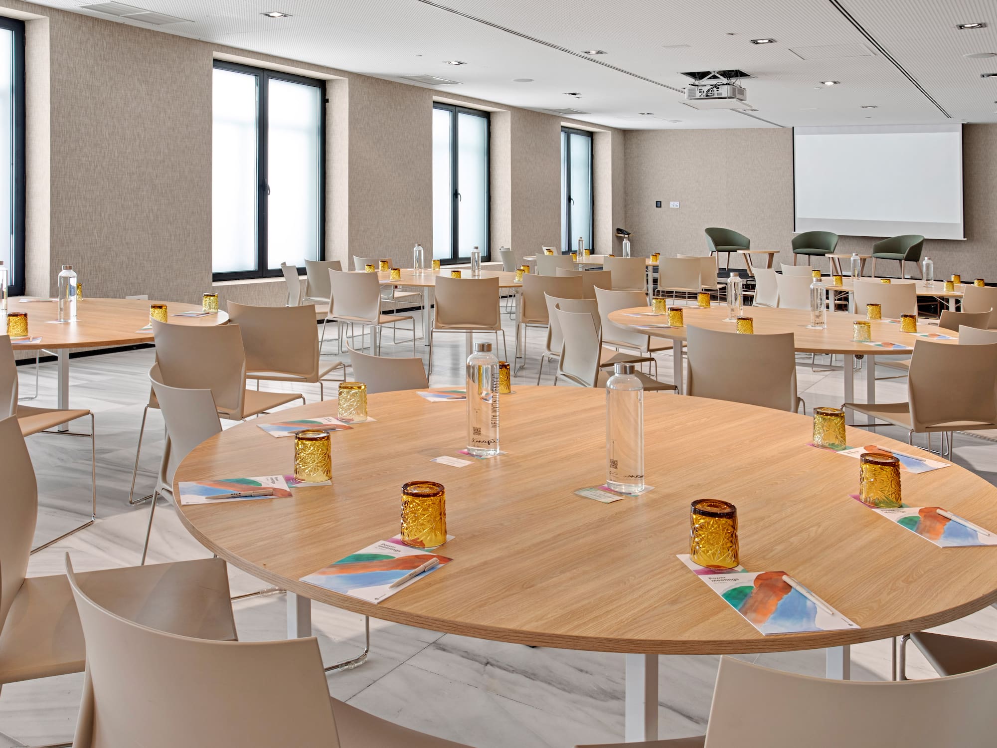 a room with tables and chairs