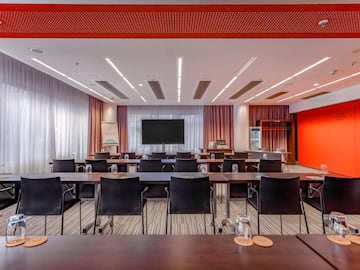 a room with tables and chairs