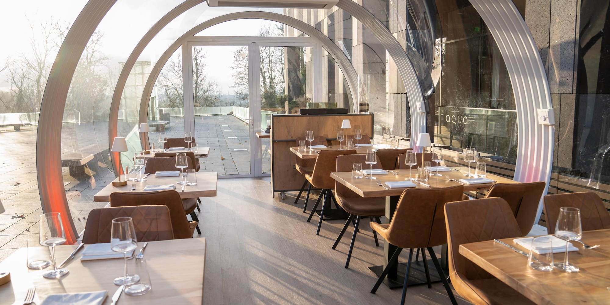 a restaurant with tables and chairs