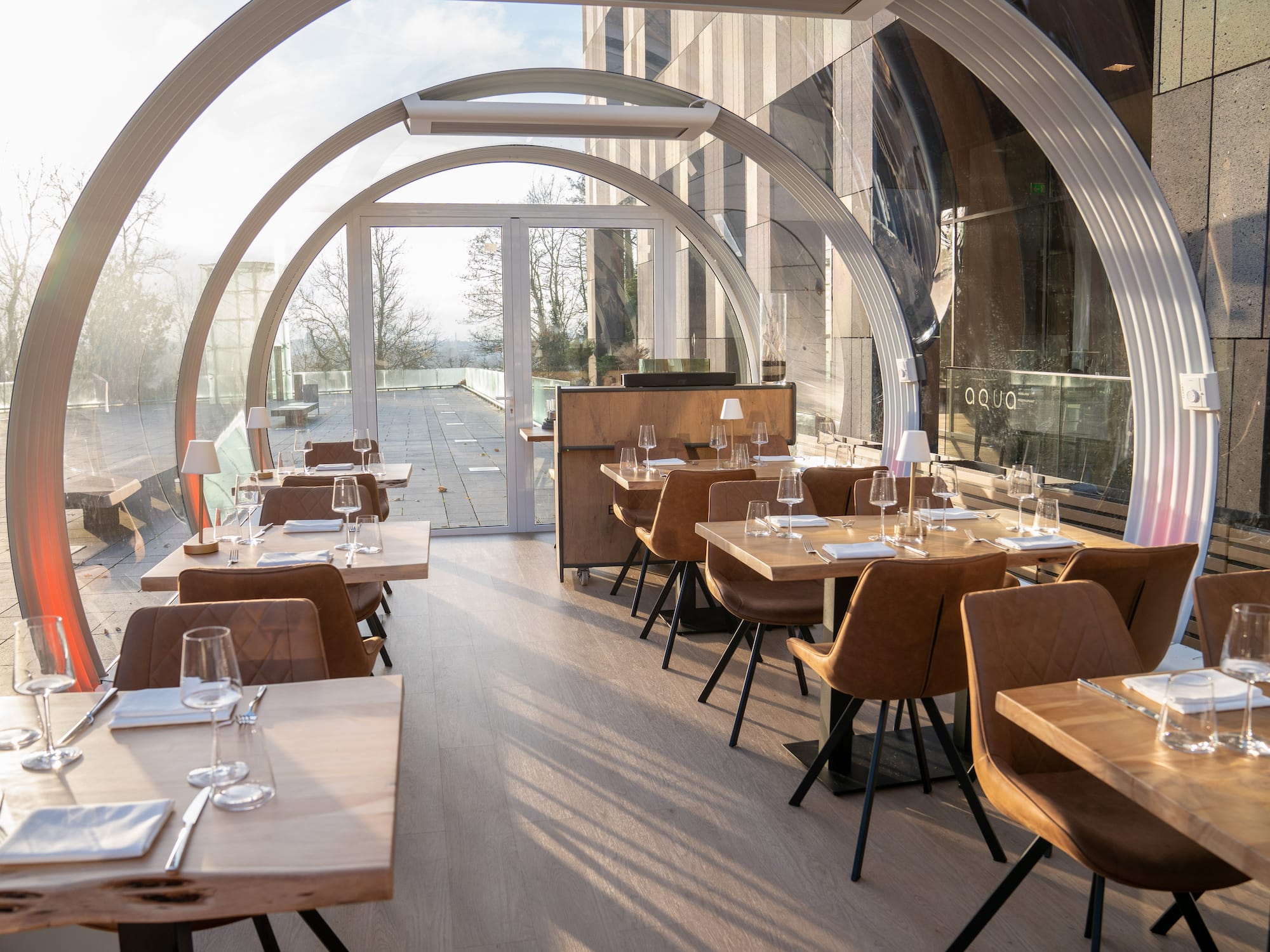 a restaurant with tables and chairs