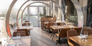 a restaurant with tables and chairs