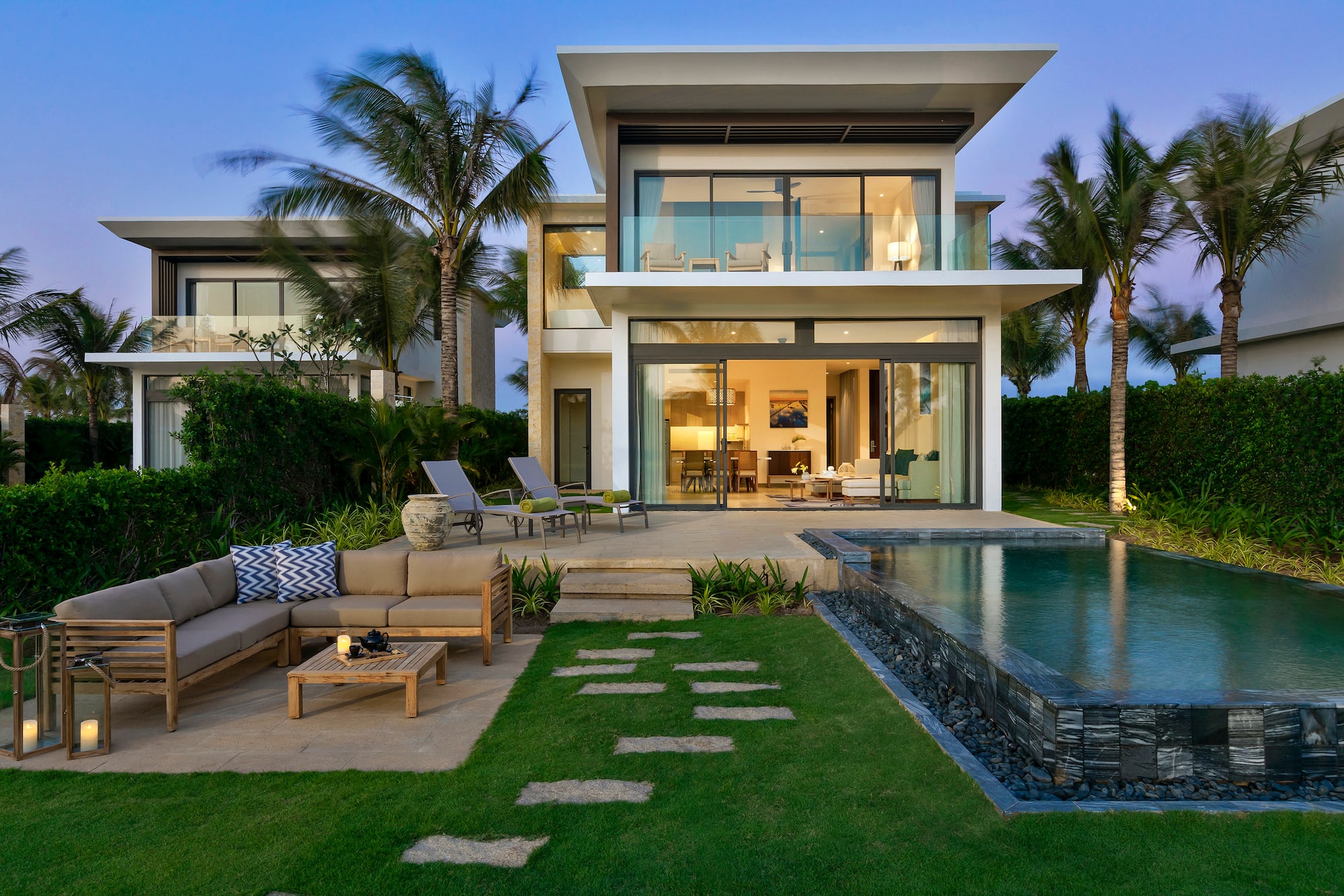 a house with a pool and a couch
