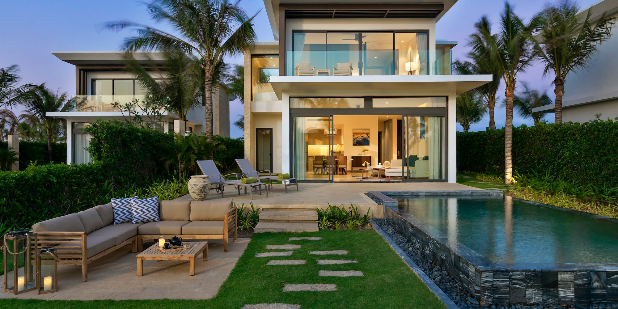 a house with a pool and a couch