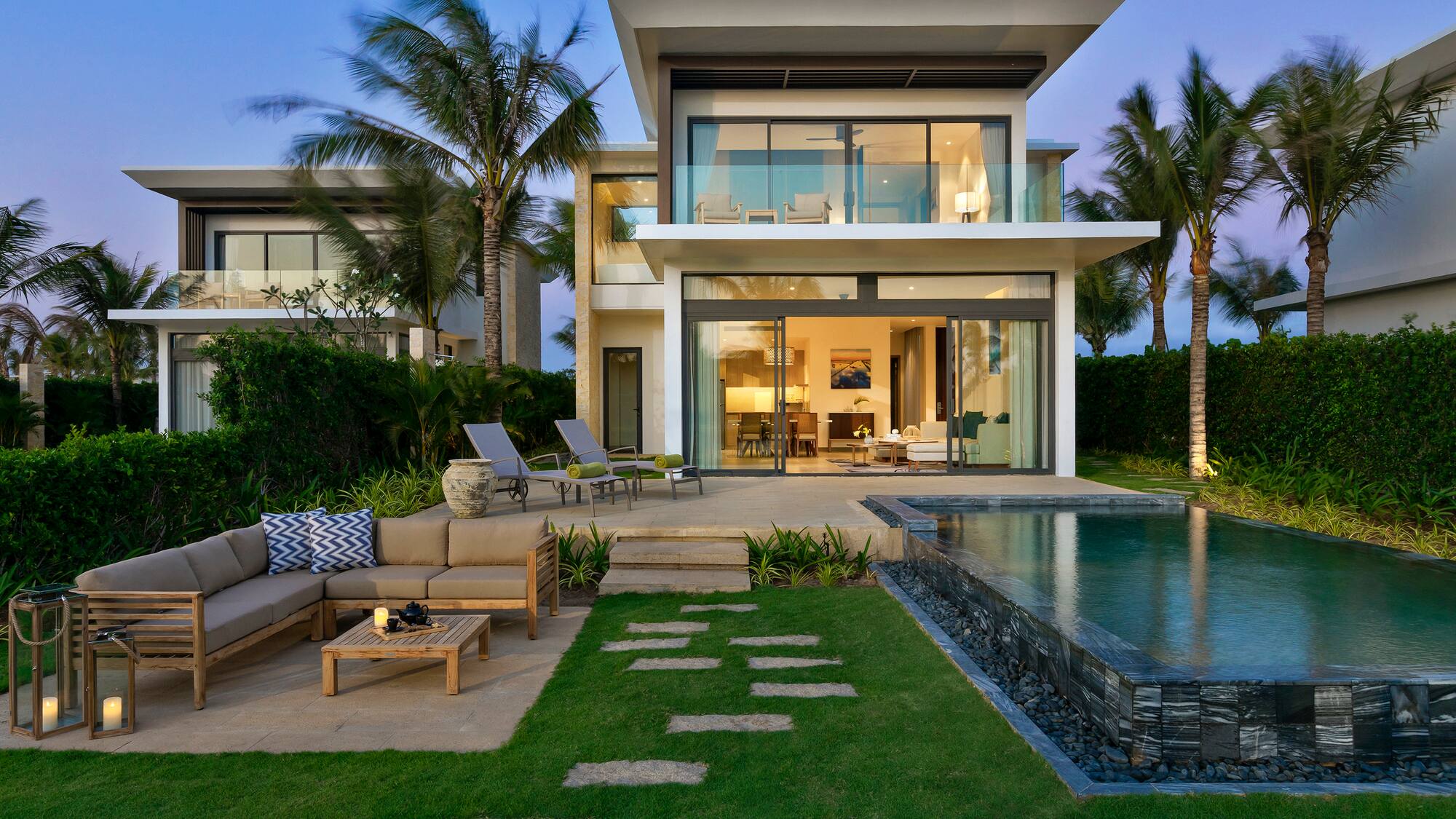 a house with a pool and a couch